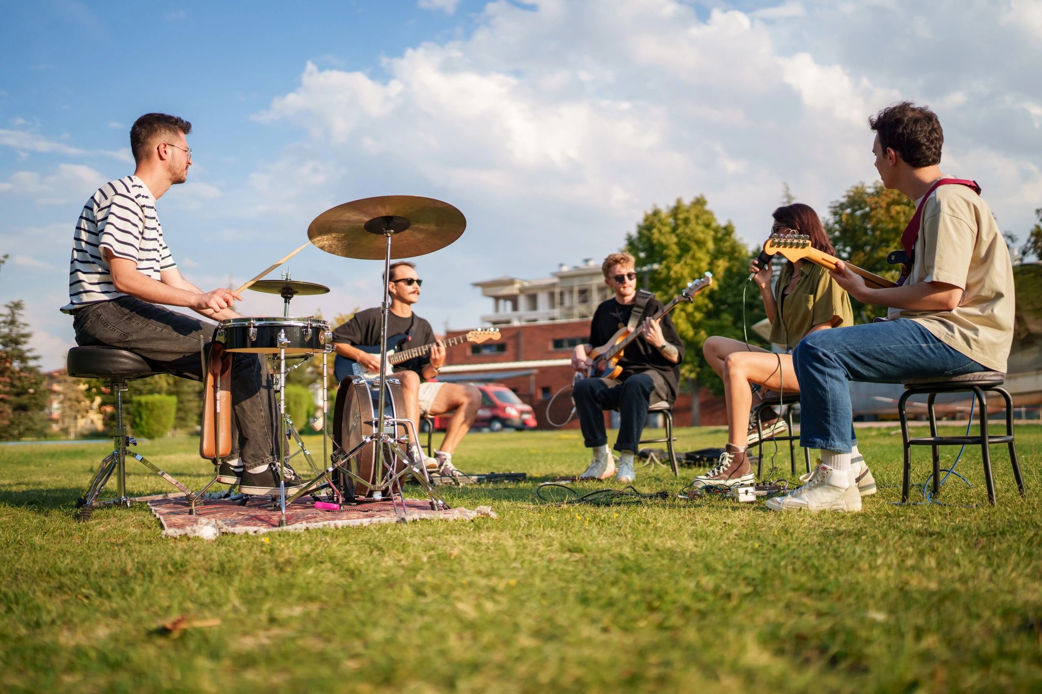 Outdoor acoustic band performing during a community music event